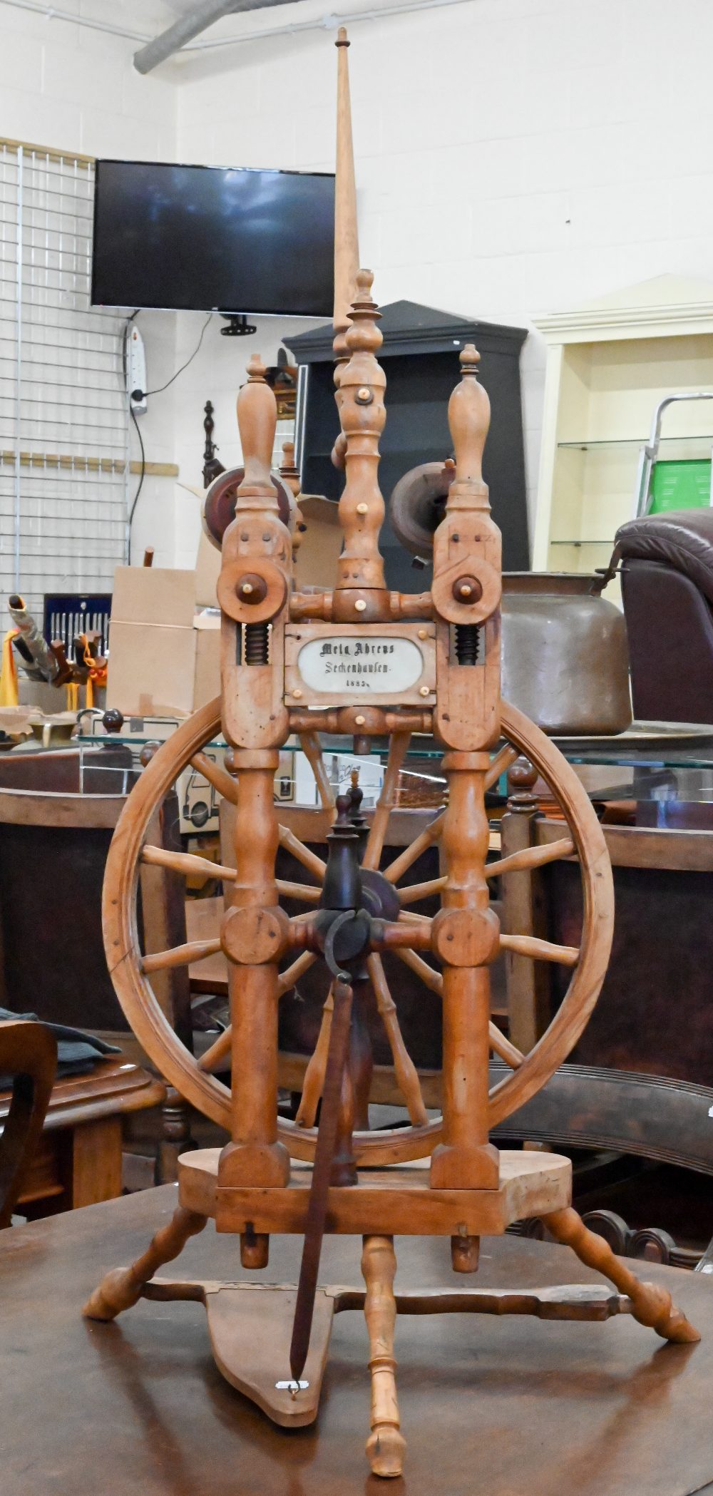 Meta Abrews Sedenboufen 1885 - An antique turned fruitwood spinning wheel