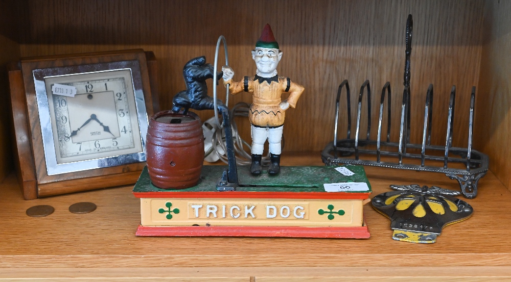 Reproduction cold painted cast iron novelty 'Trick Dog' money box, to/w ep toast rack, chrome and