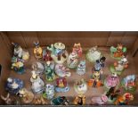 A collection of sixty-eight Royal Doulton 'Bunnikins' china figures (2 boxes)