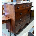 A large Victorian mahogany chest of two short over three long drawers with turned handles (one