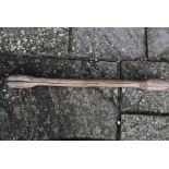 An African trival carved club/grain pounder, 84 cm long