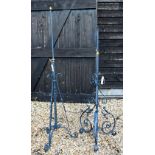 Two grey painted wrought iron and brass adjustable standard lamps (2)