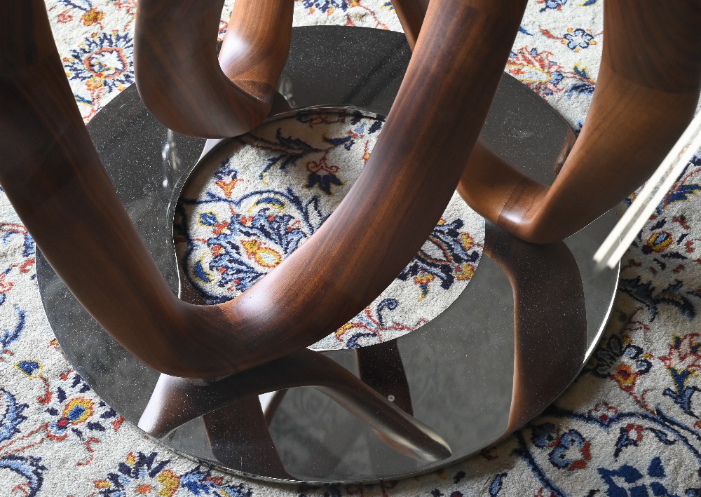 An Italian Porada Infinity dining table with circular glass top on an American walnut Mobius loop - Image 5 of 7