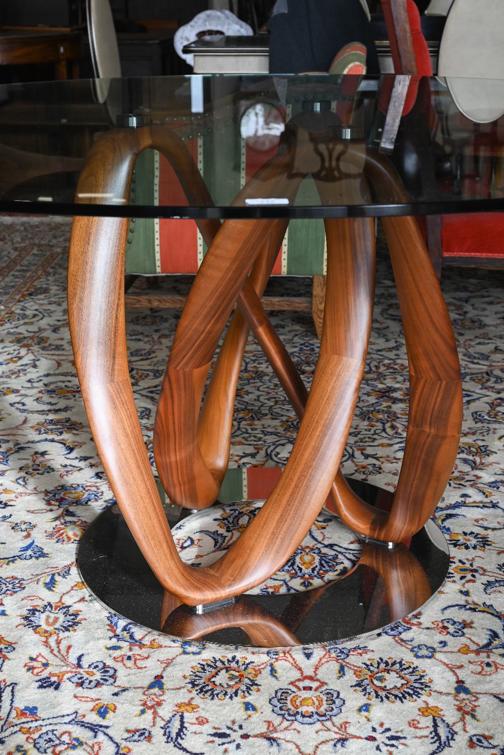 An Italian Porada Infinity dining table with circular glass top on an American walnut Mobius loop - Image 3 of 7