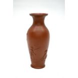 A Continental, possibly German, terracotta baluster vase in the Chinese Yixing manner, the body with