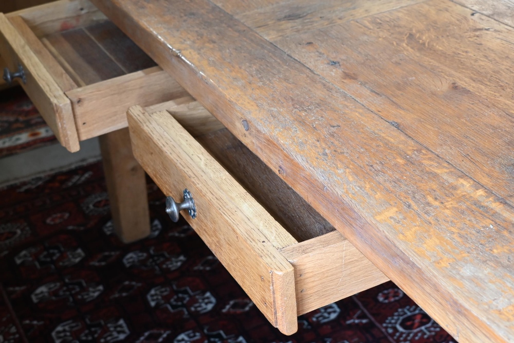 A provincial French oak dining table with cleated rectangular top raised on square leg, 180 x 90 x - Image 2 of 3