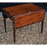 A 19th century two-drawer mahogany Pembroke table with coromandel cross-banding, drop leaf top