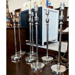 Seven chrome plate slimline table lamps 52 cm high