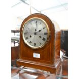 Strung mahogany German mantel clock, striking on a coiled cong, 29 cm high