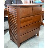 A stained hardwood chest of two short over three long drawers, 78 cm wide x 40 cm deep x 89 cm high