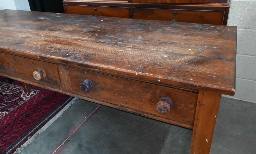 A provincial stained pine dresser base with three drawers and turned handles raised on square - Image 2 of 3