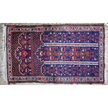 A Persian Baluchi prayer rug, dark blue ground, 140 x 80 cm