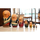 Nine various painted wood novelty Russian dolls, featuring Soviet presidents, British Prime