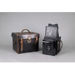 A Thornton Pickard Special Ruby Reflex camera with P Cooke Astigmatic lens and black bellows, in