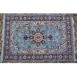 Indo-Persian floral rug, mid-blue ground, rosette border, 180 x 130 cm