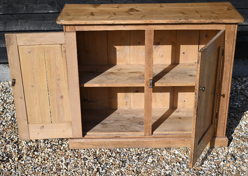 A waxed pine hall cupboard with panelled doors, 116 cm wide x 44 cm deep x 94 cm high - Image 2 of 3