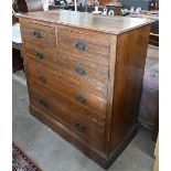 A Harris Lebus, London oak Arts and Crafts chest of two short over three long drawers, 108 cm wide x