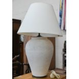 A 'Greek Urn' terracotta and brass mounted table lamp with painted stone effect textured finish,