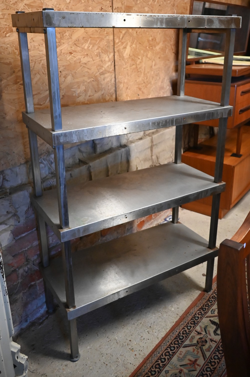 A stainless steel four-tier catering rack, 90 x 40 x 151 cm h
