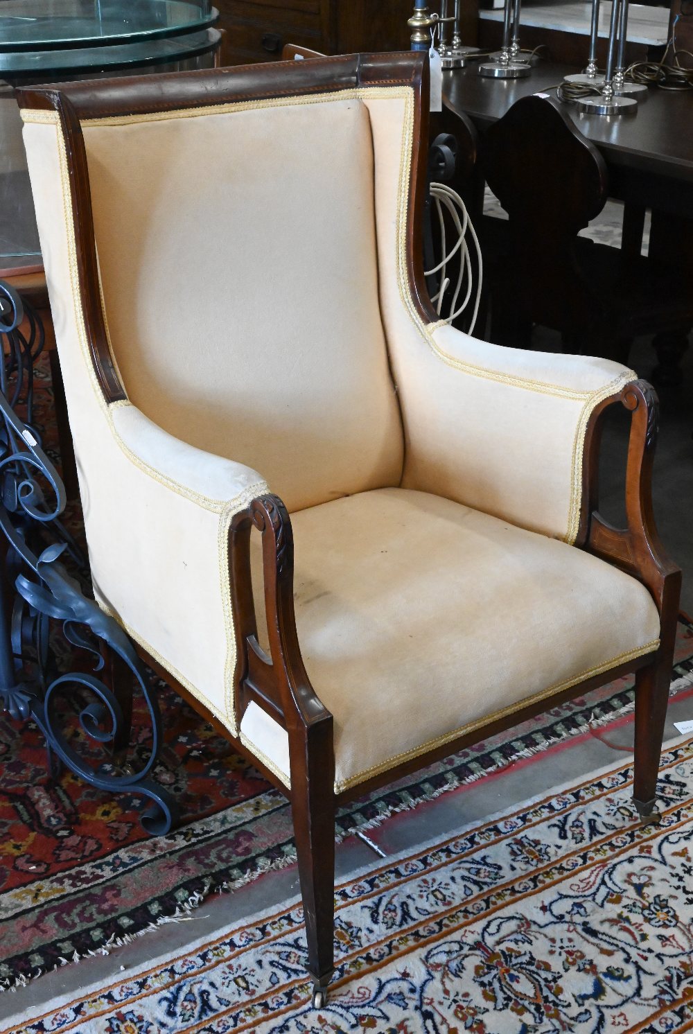 An Edwardian walnut and satin inlaid parlour armchair