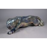 A French Gres-Flammes Vosges Rambervillers earthenware stalking tiger with silver-resin lustre