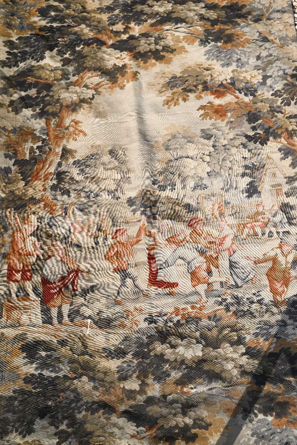An antique Belgian tapestry frolicking pastoral scene