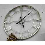 A modern gilt metal skeleton wall clock