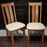 Six oak bentwood high back dining chairs with cream leatherette upholstery, made by Steven Baker