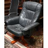 An Ekomes style armchair, faux green leather upholstery a/f, to/w modern chrome finish office