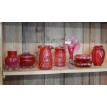 Seven pieces of Victorian and later cranberry glass, including Art Nouveau style pitcher plant vase