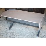 A grey painted two tone drop-leaf sofa table by Nathan, 142 x 52 x 46 cm high