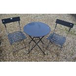A circular terrace table and two chair set (3)
