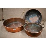 Three graduated two-handled circular copper preserve pans, 32 cm diam, 39 cm diam and 46 cm diam (3)