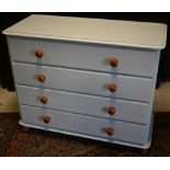 A pale cream painted pine four drawer chest with turned pine handles, on bun feet, 108 cm x 46 cm