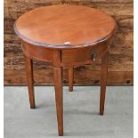 A circular cherrywood Barker & Stonehouse 'flagstone' lamp table with single drawer and tapering