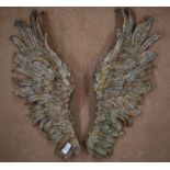 A pair of decorative gilt resin carved angel wings for wall mounting, 60 cm high (2)