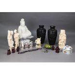 A large Chinese carved alabaster figure (the bodhisattva of compassion) Guanyin seated upon a carved