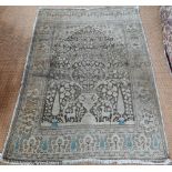 A camel ground Persian Meshed rug, worn, low pile, 166 cm x 121 cm to/with a silk Indo-Persian