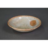 A Chinese Qingbai shallow bowl, Song Dynasty, the exterior with incised lotus decoration and plain