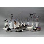 Approx 120 various hat and stick pins, some mounted in china holders, others in silver plated