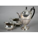 Victorian silver oval urn-shaped coffee pot with composite finial, on weighted stemmed foot, W&G