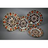 Pair of Royal Crown Derby Imari 27 cm dinner plates to/w a 23cm plate and a 22 cm plate (4)