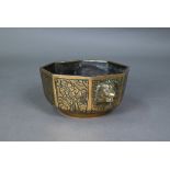 A late 19th century Chinese bronze bowl or censer, late Qing dynasty, octagonal form with a pair