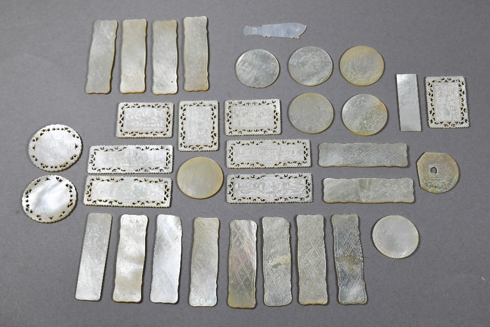 A collection of 18th and 19th century Chinese mother-of-pearl gaming counters including a mounted - Image 2 of 10