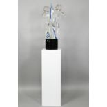 A large Stefano Toso Murano glass group, dancing couple, on cylindrical black glass plinth, 77 cm