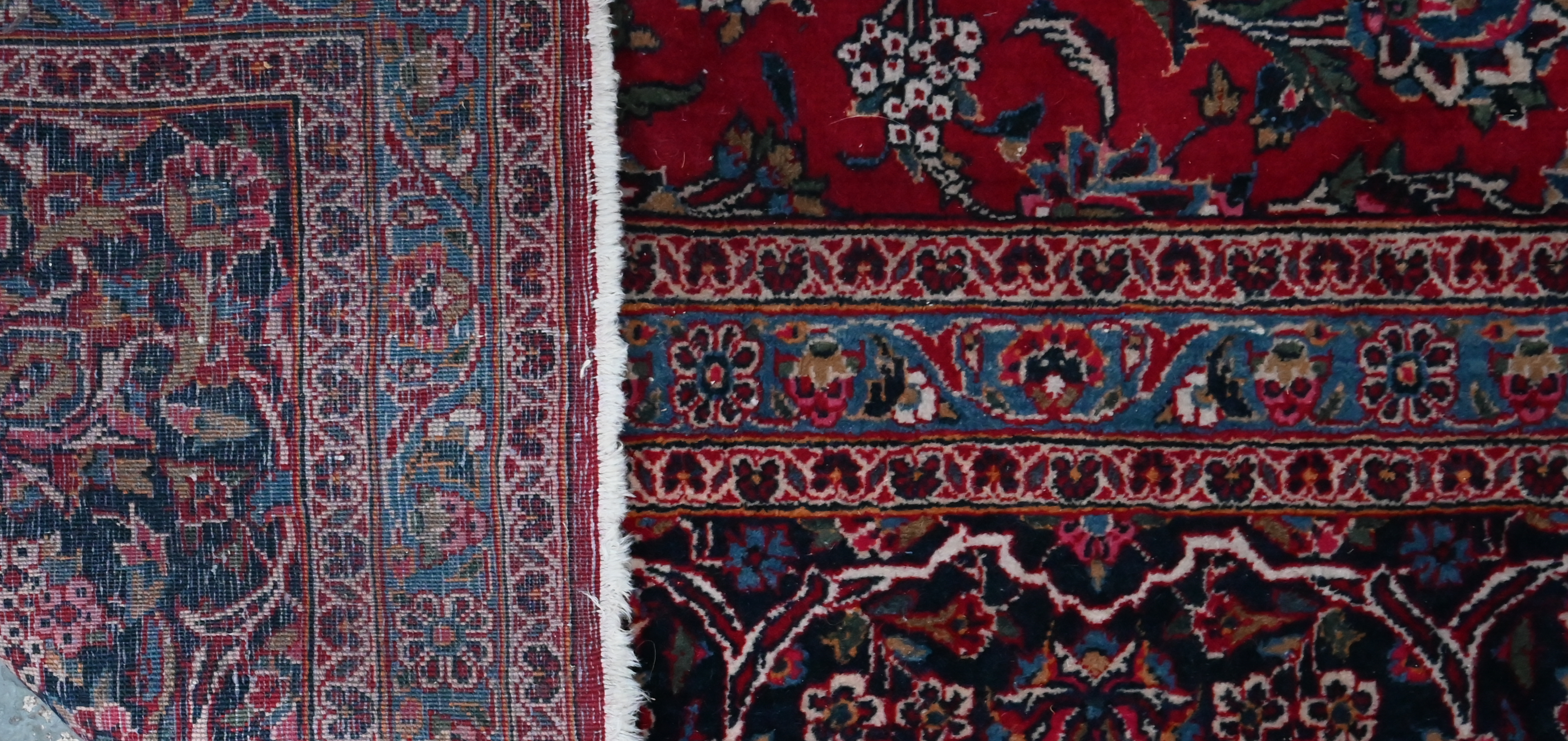 A fine old Persian hand-made Kashan carpet, the red ground with repeating linked garden vine design, - Image 7 of 12