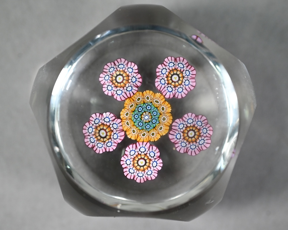 Facetted glass pentagonal paperweight with floral canes and star-cut base, 6 cm diam to/w a - Image 6 of 7