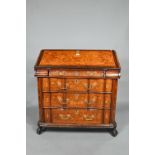 An 18th/19th century Dutch floral marquetry walnut bureau, the hinged slope enclosing a part