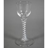 A Georgian cordial glass with fluted bowl, on opaque twist stem and domed foot, 14 cm