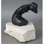 Susan Hadley, a bronze kneeling nude sculpture, initialled 'SH', raised on a rough stone base, 28 cm
